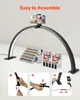 A desk lamp with a phone holder, nail polish display, and other beauty supplies. Anteprima dell’immagine prodotto