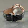 Close-up view of a watch strap and case back. Produktbild-Vorschau