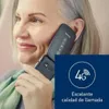 A woman is holding a flip phone to her ear, with a marketing overlay in the corner. Náhľad obrázku produktu