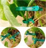 Collage of images showing green plant clips attached to plant stems. Produktbild-Vorschau