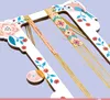 A close-up shot of a bead weaving loom with two bracelets being created. Podgląd zdjęcia produktu