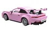 A pink Lego-style sports car with a spoiler, shown from a rear-side angle against a white background. Voir les images du produit