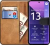 A book-style phone case with a Xiaomi Redmi Note 13 Pro+ 5G phone inside, along with cards and banknotes. Produktbild-Vorschau
