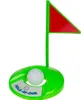 A toy golf set with a golf ball, a green putting green base, and a flag with a red triangle. Anteprima dell’immagine prodotto