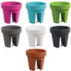 A collection of seven balcony planters in various colors, arranged in a grid. Produktbild-Vorschau