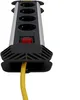 A close-up, low-angle shot of a Stanley power strip with a yellow cord. Podgląd zdjęcia produktu