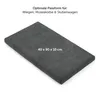 A dark gray mattress or pad is shown at an angle on a white background. Produktbild-Vorschau