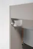 A close-up view of a cabinet hinge mechanism and a partially extended drawer. Anteprima dell’immagine prodotto