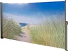A retractable side awning with a scenic beach landscape print. Náhled obrázku produktu