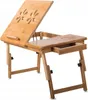 A wooden laptop desk with adjustable legs and a tiltable surface. Náhľad obrázku produktu