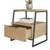 A modern nightstand with an open drawer and a plant on top. Podgląd zdjęcia produktu