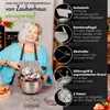A woman is demonstrating a food mill with various features highlighted with text and diagrams. Produktbild-Vorschau