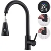 A black kitchen faucet with a digital display showing temperature and time. Produktbild-Vorschau