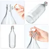 Collage of four images showing a glass bottle with a swing-top lid. Anteprima dell’immagine prodotto