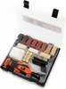 A repair kit for wood products, including a small electric tool, various colored wax sticks, and batteries, all neatly arranged in a clear plastic case. Náhled obrázku produktu
