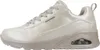 A side view of a beige Skechers sneaker. Voir les images du produit