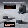 A robotic vacuum cleaner and its docking station are shown on different carpet textures, with text highlighting features. Produktbild-Vorschau