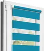 A close-up view of a teal and white striped roller blind installed in a white window frame. Produktbild-Vorschau