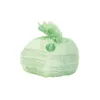 A single green trash bag tied at the top, shown against a white background. Podgląd zdjęcia produktu