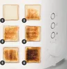 A toaster with six slices of bread showing different levels of toasting, from untoasted to burnt. The toaster controls are visible on the right side. Produktbild-Vorschau