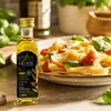 Physis of Crete Olivenöl Flasche neben Pastagericht Produktbild-Vorschau