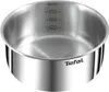 A close-up studio shot of a stainless steel pot with measurement markings inside. Produktbild-Vorschau