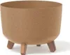 A brown planter pot with three wooden legs, shown against a white background. Náhľad obrázku produktu