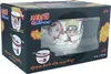 The image shows the packaging for a Naruto Shippuden ramen bowl with chopsticks. The packaging features illustrations of Naruto and Sakura, along with the Naruto Shippuden logo and product details. Podgląd zdjęcia produktu