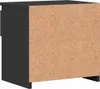 The back and side of a black cabinet or furniture piece with a particle board backing. Náhľad obrázku produktu