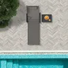 An overhead view of a lounge chair and small table next to a swimming pool. Náhled obrázku produktu