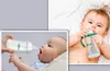 Collage of two images showing a baby being fed with a bottle and a baby holding a bottle. Podgląd zdjęcia produktu