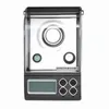 A digital milligram scale shown from the front. Voir les images du produit