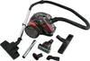A vacuum cleaner and its accessories are laid out on a white background. Náhled obrázku produktu