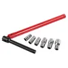 A set of tools, including a red handle and several silver sockets, laid out on a white background. Náhled obrázku produktu