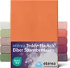 A product shot of an orange fitted sheet, with other colored fitted sheets visible in the background. Anteprima dell’immagine prodotto