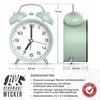 A mint green analog alarm clock with dimensions and features listed. Produktbild-Vorschau
