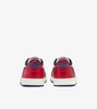 The back view of a pair of Nike Air Jordan 1 Retro Low sneakers. Voir les images du produit