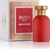 A red perfume bottle and its packaging are displayed against a white background. Podgląd zdjęcia produktu