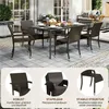 An outdoor patio setting with a dining table and chairs. Produktbild-Vorschau