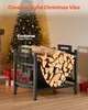 A firewood rack filled with logs is placed in a festive Christmas setting with a decorated tree and gifts. Produktbild-Vorschau