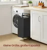 A laundry basket is placed next to a washing machine in a laundry room. Produktbild-Vorschau