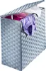 A laundry basket with clothes inside and the lid open. Náhled obrázku produktu