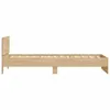 A side view of a wooden bed frame on a white background. Produktbild-Vorschau