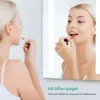 A woman applying lipstick in front of a mirror with LED lighting. Produktbild-Vorschau