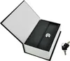 An open book-shaped safe with two keys next to it. Anteprima dell’immagine prodotto