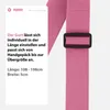 A close-up of a pink luggage strap with a black buckle, next to a white panel with product information in German. Anteprima dell’immagine prodotto