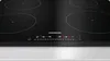 A close-up view of a black induction cooktop with illuminated controls. Produktbild-Vorschau