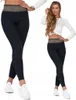 A woman modeling black leggings with a gray waistband. Produktbild-Vorschau