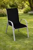 A single black outdoor chair is placed on a green lawn in a garden setting. Produktbild-Vorschau