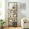 A bookshelf filled with decorative items and books in a living room setting. Náhled obrázku produktu